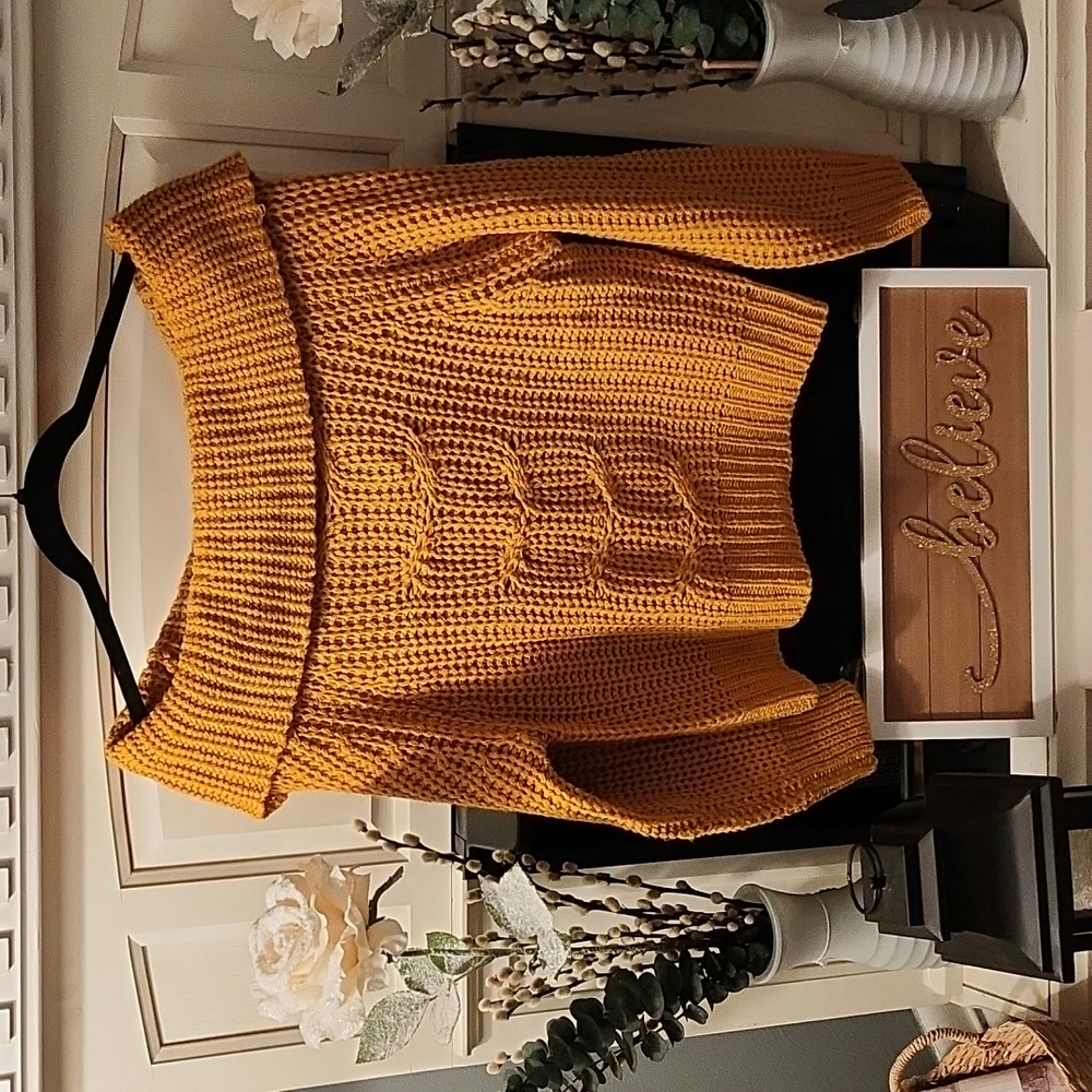 Cute off the shoulder women's sweater. 1st photo- Front 2nd photo-shows back